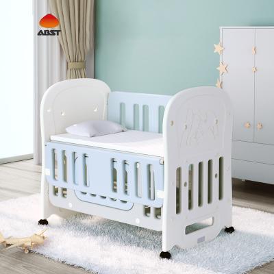 China Movable Modern Multifunctional HDPE Safety Kids Cradle Bed Baby Crib Indoor White Mobile for sale