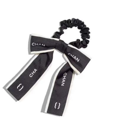 China Smart casual minimalist style design with a small scented black and white bow and a retro headband for sale