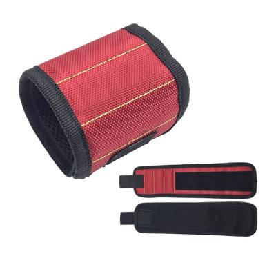 China Multi Functional High Performance Strength Tool Belt Magnet Strong Holding Wristband For Screws Nails Drill And Bit for sale