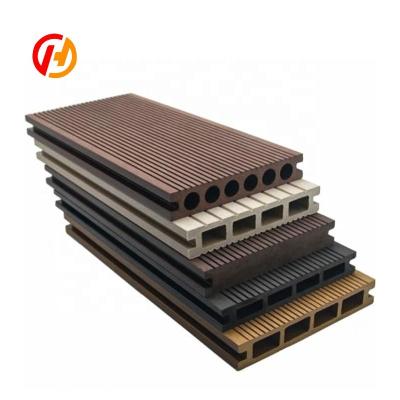 China Unifloor Traditional Wood Plastic Composite Covered Interlocking WPC Decking For Outdoor Public Area for sale