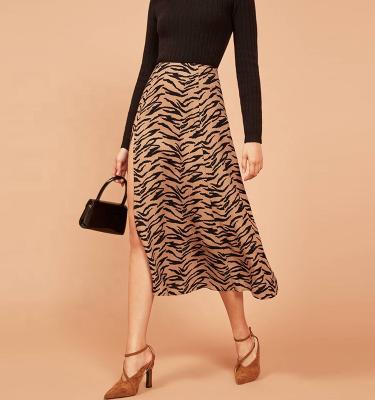 China Anti-Static Leopard Midi Skirt Plus High Waist Slit For Women High Waist Silk Satin Elasticized Skirts for sale