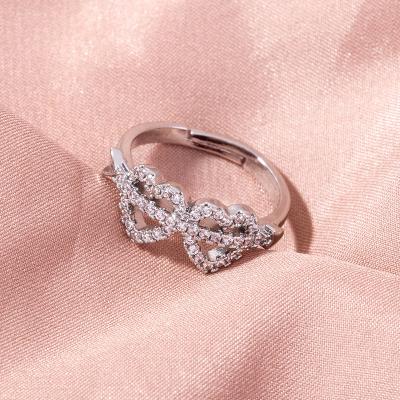 China FASHIONABLE Wholesale Handmade High End Alloy Inlaid Zircon Cupid Love Ring For Women 2021Christmas Birthday Wedding Ring Jewelry Gift for sale