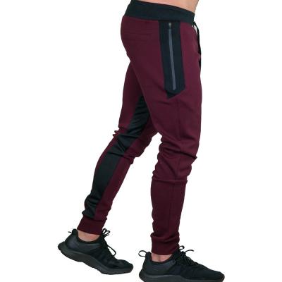 China Anti-static men's outdoor sports color block sweatpants shape slim fit working Autumn And Winter Pants Side bar pants for sale