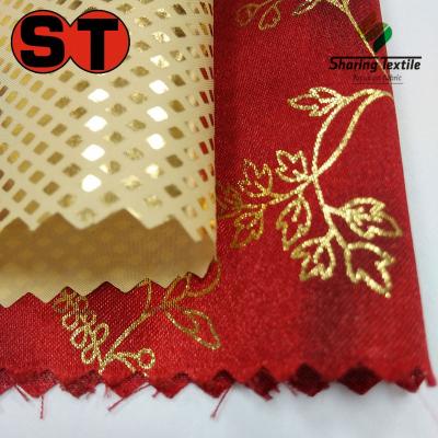 China Wholesale Shrink-resistant Christmas decoration bronzed fabric/Christmas decorative embossed fabric/Christmas decoration flower foil fabric for sale