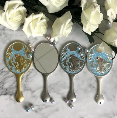 China 2020 New Style Fashional Metal Handle Makeup Personalized Cosmetic Mirror for sale