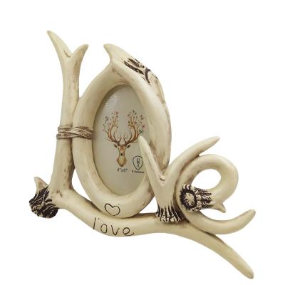 China Environmentally Friendly Resin LOVE Photo Frame Creative Antler Picture Frame for sale