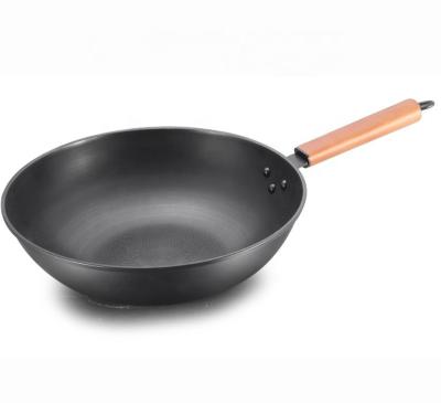 China General use for gas and induction cooker carbon steel wok flat bottom iron cookware vegetable oil coating black wok pan with beech wood handle for sale