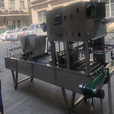 China Full Automatic Beverage Cup Popcorn Popcorn Filling Sealing Machine For Popcorn for sale