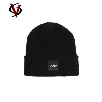 China Custom Logo Patch 100% Acrylic Warm Knitted Beanie Hat Ribbed Winter Hats for Unisex for sale