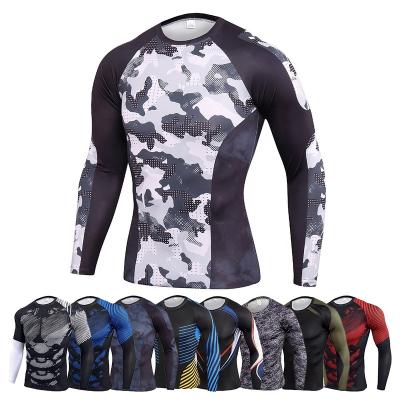 China QUICK DRY Printed Compression Tights Wear Rash Guard Sexy Bjj Men Sports Long Sleeve Breathable Running Shirt Manufacturer for sale