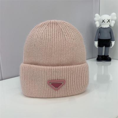 China Autumn and winter style P style JOINT home inverted triangle high quality luxury brand knitted hat women's wool hat warm knitted hat for sale