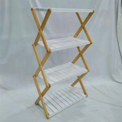 China Folding Rack Stocked 4 Layer Wooden Flower Pot Rack for sale