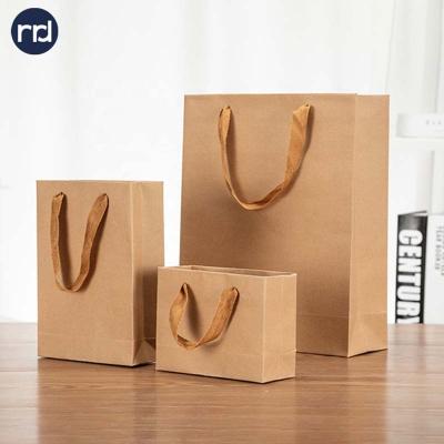 China Wholesale Brand New Recyclable Cheap And Fine Shopping Gift Packaging Small Paper Bag With Your Own Logo for sale