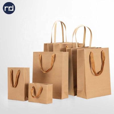 China Recyclable High Standard Printing Paper Shopping Kraft Gift Bag With Your Own Logo for sale