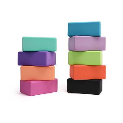 China Custom color logo factory wholesale price fitness double layer yoga block EVA Foam monochromatic high density yoga block for sale