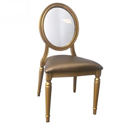 China XINMOLL Durable Direct Supply Faux Wood Wedding Chairs With Resin Around Metal Louis Dining Chairs Gold Frame Back Leather Seat for sale