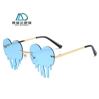 China 2021 European and American fashionable unique colorful lens ocean sunglasses heart-shaped sunglasses for sale