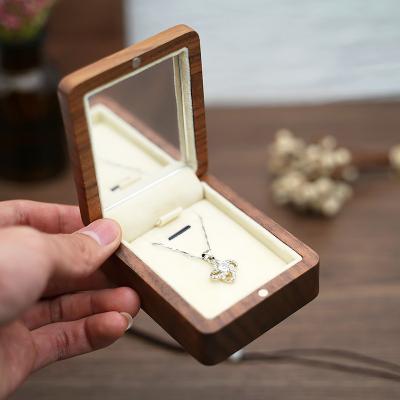 China Hot-selling solid wood handmade high-grade pure magnetic button storage box necklace advanced opening and closing sense for sale