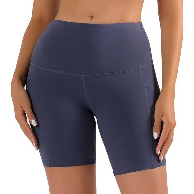 China QUICK DRY yoga shorts female tight pocket cycling pants quick-drying high waist hip lift workout shorts spring and summers for sale