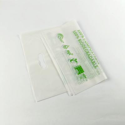 China New Wholesale BIODEGRADABLE Organic Small Cornstarch Handle Garment Die Cut Plastic Degradable Bag for sale