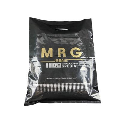 China BIODEGRADABLE Wholesale Eco Friendly Gold Printed Apparel Die Cut Handle Black PE Plastic Polybags With Handles for sale