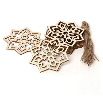 China Pendant Eid Mubarak Hollow Wood Decoration Europe Natural Wooden Snowflake Small for sale