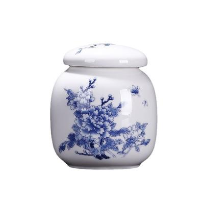 China Hot Selling Freshness Preservation Blue And White Ceramic Storage Jars Liquid Sealed Ceramic Bee Tank for sale