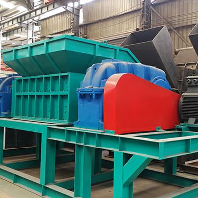 China Kleding Schroot Metal Aluminium blikken Shredder Machine IJzer Plastic afval auto Twee schacht Shredder Recycling Machine Te koop