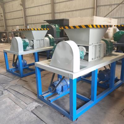 China Home Waste Recycling Twin Shaft Twin Motor Shredder with Double Shaft Design and Good for sale