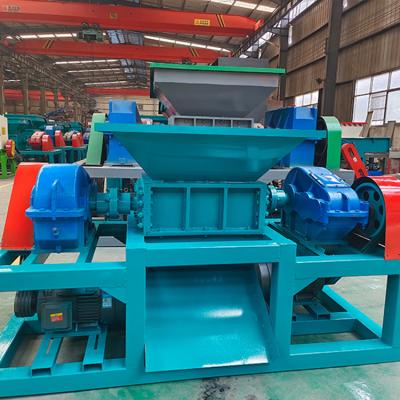 China Máquina de trituração industrial de duplo eixo para sucata de papelão e metal Peso 1400 kg à venda