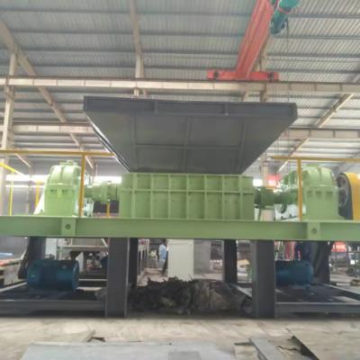 China Twin Shaft Scrap Metal Shredder Crusher voor aluminium blikken in machinewerkplaatsen Te koop