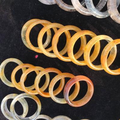 China China Wholesale Natural Rock Bangles Hand Carved Rutilated Quartz Bangles for sale