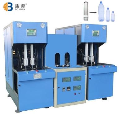 China Semi-automatic Bottle PET Bottle 50ml-2l Blow Molding Machine With Two Preheater for sale