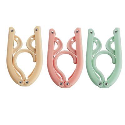 China Minimalist Bestlife Creative Multifunctional Magic Travel Hanger Portable Collapsible Hanger for sale