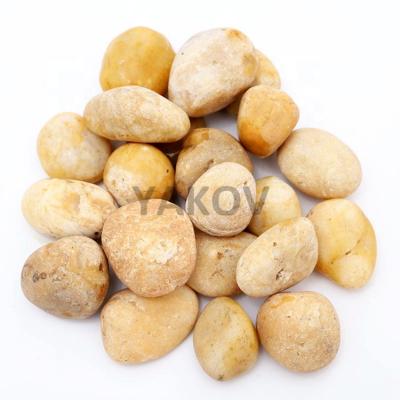 China Chinese Wholesale Garden Landscaping Unpolished Natural Yellow Pebbles Stone For Decoration for sale