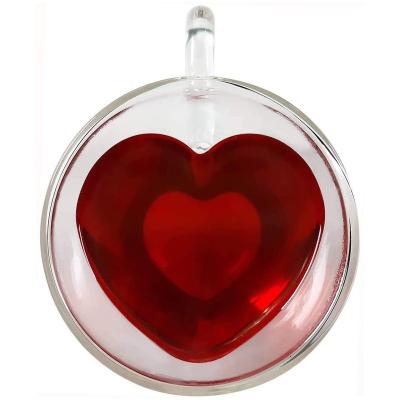 China Newest Selling Hot Viable Heart Shaped Clear Glass Milk Cup Double Glass Tea Cup With Handle for sale