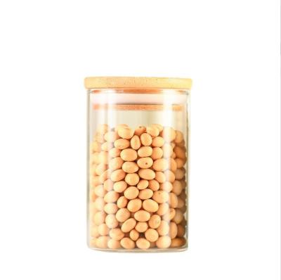 China 200ml 300ml 500ml Airtight Empty Glass Jar High Quality Heatable Unique Glass Food Jar With Bamboo Lids for sale