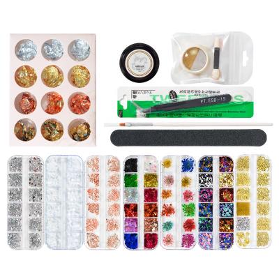 China Nail Charms Nail Art Jewelry Set 8 Boxes Nail Art Glitter Rivet Flower Pearl Foil Dry Set with Folder Tweezers Dotting Pen Liner Brush for sale