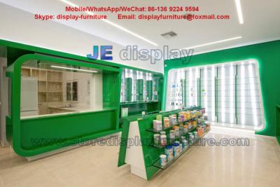 China Health drugs Store Display Furniture for Interior Design by Green color Wood  Cabinet and Tempered Glass Shelves for sale