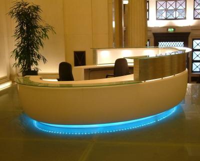 China Bespoke Millwork reception counter in Pure white painting by tempered glass top with LED inside lighting for sale