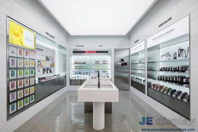 China Cosmetics Store Interior Design In wall Display Cabinets with Glass shelves and Wood counters by LED light for sale