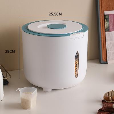 China Sustainable Kitchen Rice Bucket Dog Food Storage With Measuring Cup Plastic Rice Storage Containers for sale