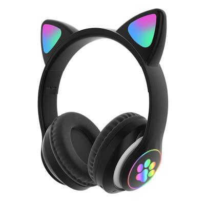 China Durable STN28 Macaron cat ear children earphone fm tf card kids headphones cat shaped led color changing wireless BT earphone for sale