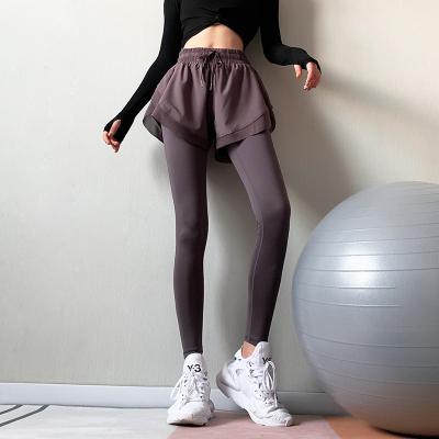 China Two Pieces Breathable Sportswear Quick Dry Workout Sweatpants Women's High Waisted Fitness Pants Slim Running Elastic Yoga Pants for sale