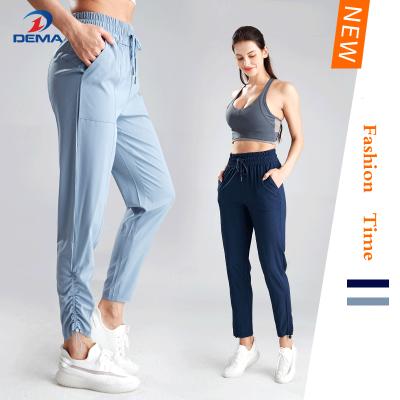 China Breathable Dema Sports 2021 New European And American High Waist Drawstring Fitness Pants Women Loose Casual Sports Yoga Clothing for sale