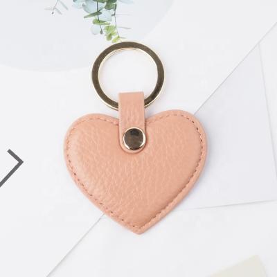 China Fluent& tidy stitching personalized genuine leather key chain rings leather key gusset for sale