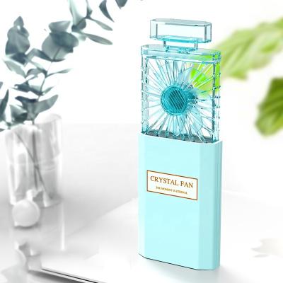 China Perfume Fan 2022 New Perfume Fan Mini Hand Cute USB Portable Rechargeable Cooling Handheld Fan Bottle Fan With Scented Piece for sale