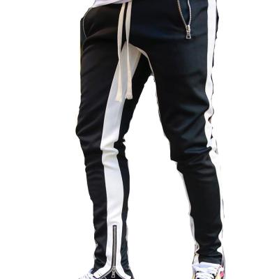 China New Breathable Sports Men's New Style High Street Pants Leisure Running Outdoor Sports Pants Foot Zipper Color Matching Pants for sale