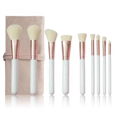 China Angular Blush White Makeup Brush Set Professional Makeup Cosmetic Brush Set With Roll Bag for sale