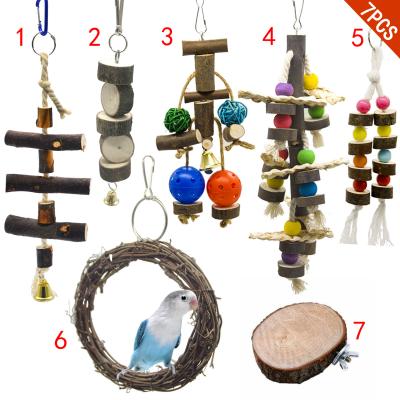 China Viable Natural Wooden Pet Bird Parrot Toys Toys 7pcs Set For Colorful Chewing Hanging Swing Toy Bells Ladder Swing Cage Corn Leaf for sale